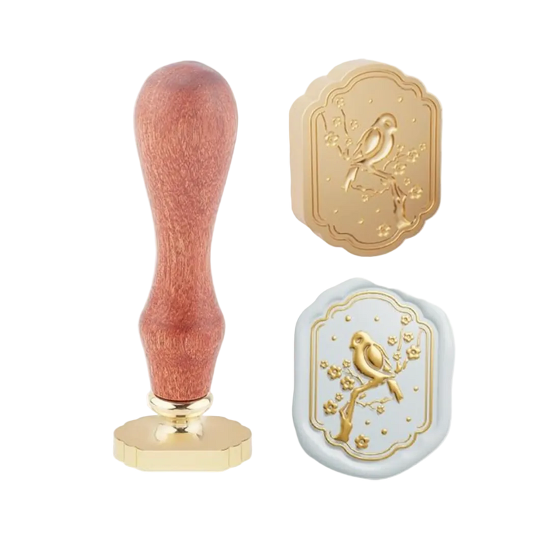 Decorative stamp with wooden handle and gold accents on a white background